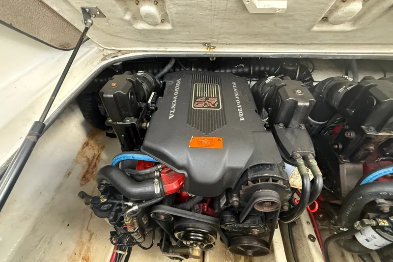 Slide: The Image of Engine compartment of a 2003 Regal Commodore 2860 with Volvo Penta 4.3 GXI engine. - 12