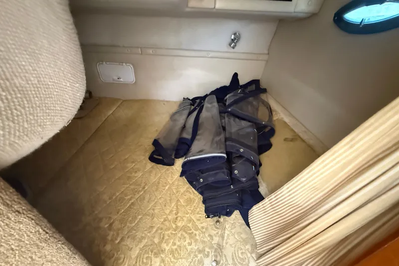 Slide: The Image of Interior cabin of 2003 Regal Commodore 2860 with folded canvas covers. - 10