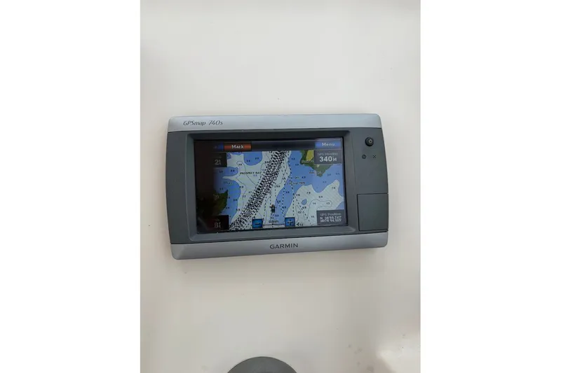 Slide: The Image of Garmin GPSmap 740s on 2013 Grady-White Freedom 275 boat dashboard. - 33