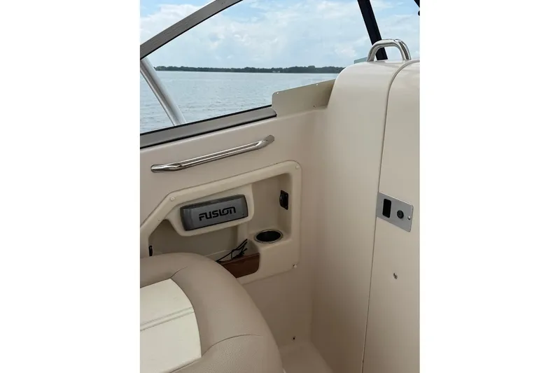 Slide: The Image of Interior view of 2013 Grady-White Freedom 275 boat with Fusion audio system. - 35