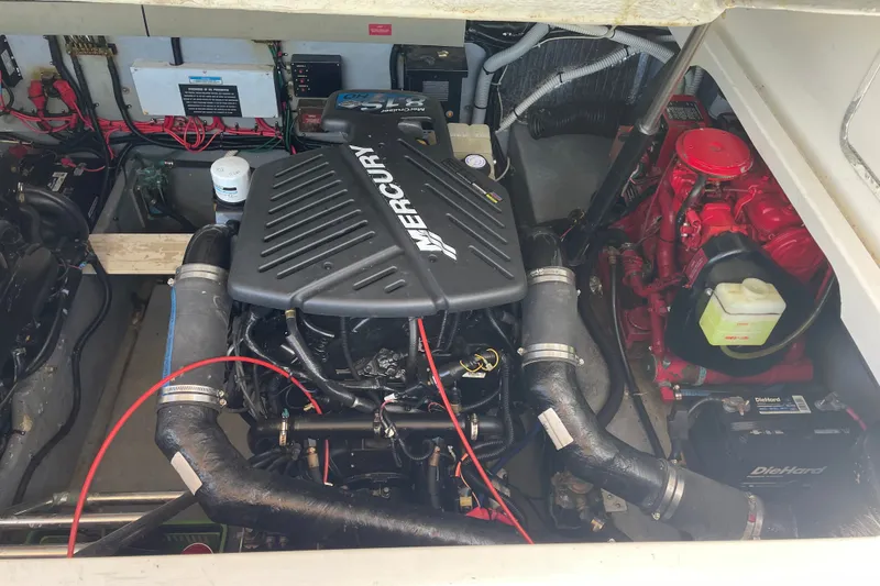 Slide: The Image of Engine compartment of a 1997 Sea Ray 370 Express Cruiser with Mercury components. - 5