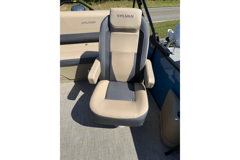 Slide: The Image of Luxurious Sylvan X-3 CLZ DH 2026 boat seat with beige and gray upholstery. - 19