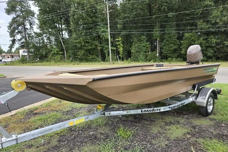The Image of 2027 Havoc 1656 MRST MACH 1 boat on Load Rite trailer, parked roadside. - 0