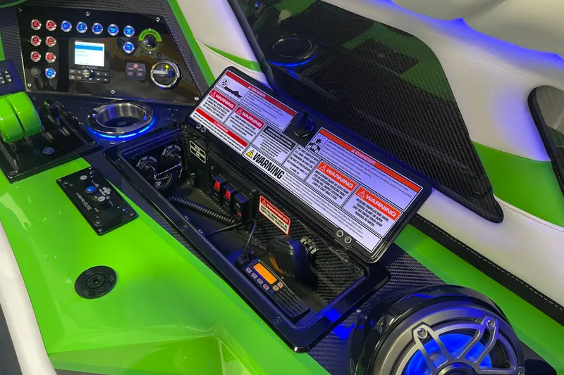 Slide: The Image of Control panel of 2022 Daves Custom Boats DCB M-44 with vibrant green accents. - 28