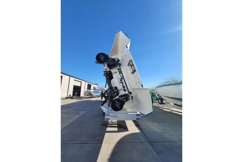 Slide: The Image of 2022 Daves Custom Boats DCB M-44 on trailer, viewed from rear, under clear blue sky. - 6