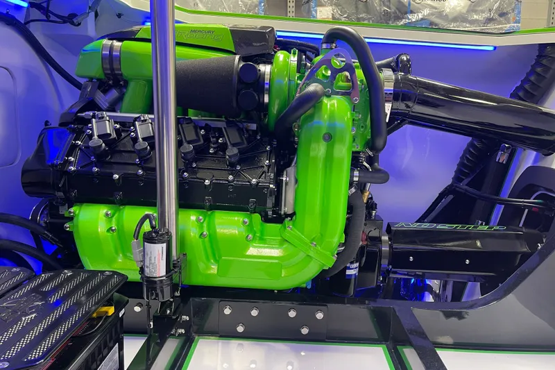 Slide: The Image of Engine of 2022 Daves Custom Boats DCB M-44 with vibrant green components. - 32