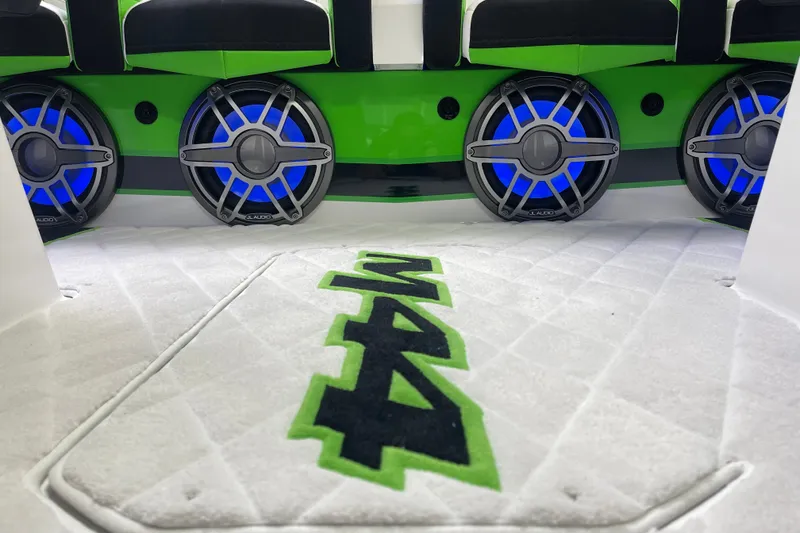Slide: The Image of 2022 Daves Custom Boats M-44 interior with vibrant blue speakers and custom flooring. - 24