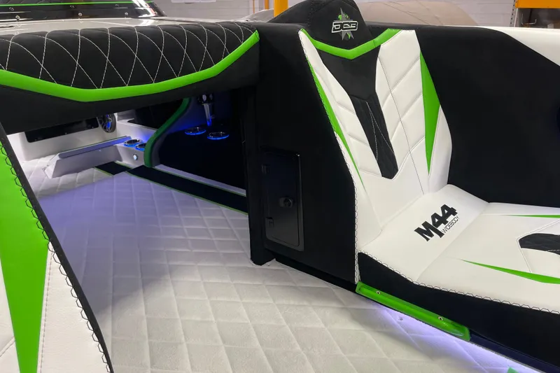 Slide: The Image of 2022 Daves Custom Boats DCB M-44 interior with green and white seating design. - 18