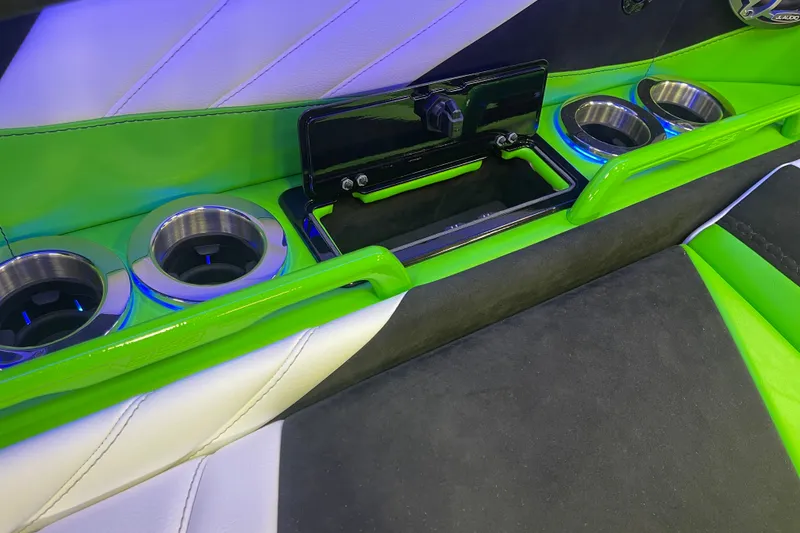 Slide: The Image of Interior of 2022 Daves Custom Boats DCB M-44 with green accents and cup holders. - 20