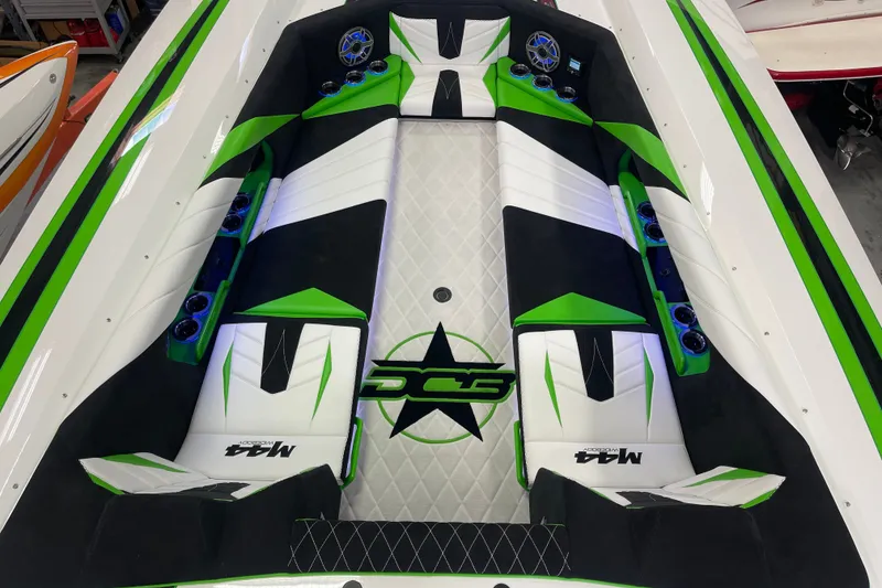 Slide: The Image of 2022 Daves Custom Boats DCB M-44 interior with green and white seating design. - 16