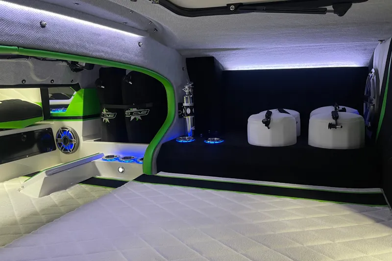 Slide: The Image of Interior of 2022 Daves Custom Boats DCB M-44, featuring modern design and ambient lighting. - 22