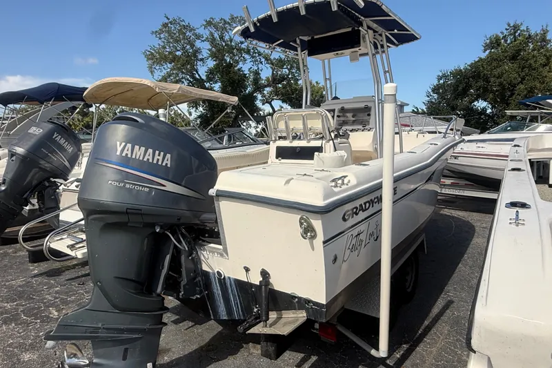 Slide: The Image of 2002 Grady-White Fisherman 222 boat with Yamaha outboard motor in a marina. - 5