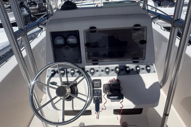 Slide: The Image of Grady-White Fisherman 222 boat console with steering wheel and controls, 2002 model. - 29