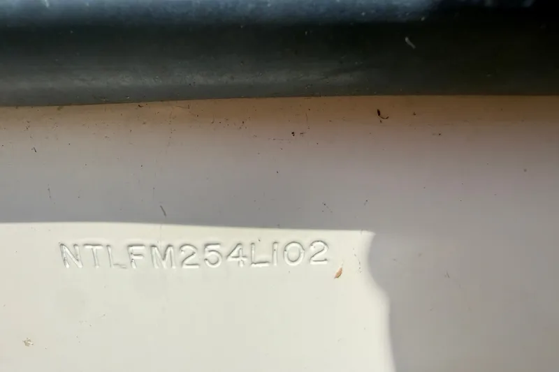 Slide: The Image of Hull identification number on 2002 Grady-White Fisherman 222 boat. - 38
