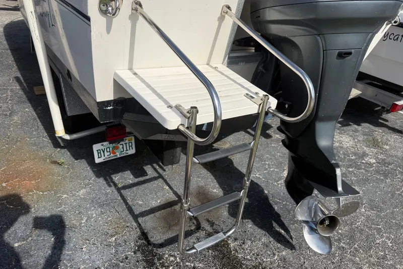 Slide: The Image of Rear view of 2002 Grady-White Fisherman 222 boat with ladder and outboard motor. - 4