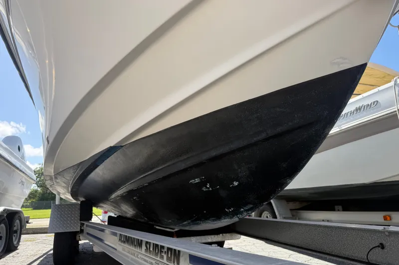 Slide: The Image of 2002 Grady-White Fisherman 222 boat on trailer, showcasing hull design. - 7