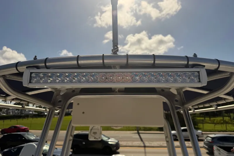 Slide: The Image of LED light bar on a 2002 Grady-White Fisherman 222 boat under a sunny sky. - 36