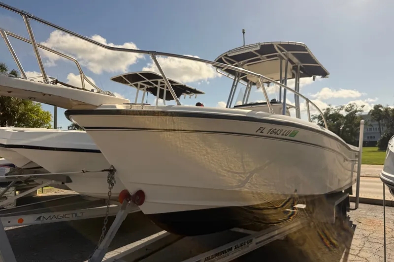 The Image of 2002 Grady-White Fisherman 222 boat on trailer under clear sky. - 0