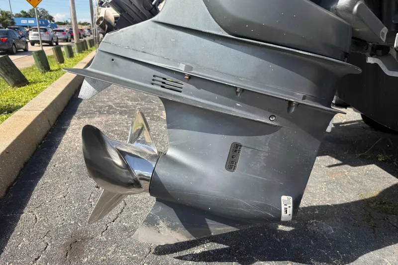 Slide: The Image of Close-up of a 2002 Grady-White Fisherman 222 boat propeller on pavement. - 6