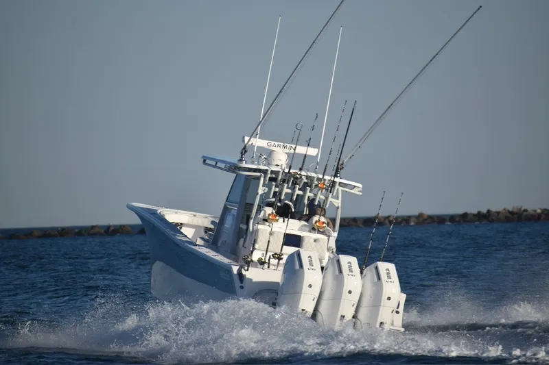 Slide: The Image of 2026 Onslow Bay 37 Tournament Edition boat navigating ocean waves. - 16