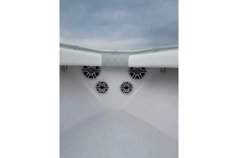 Slide: The Image of Onslow Bay 37 Tournament Edition 2026 boat speakers against cloudy sky. - 63