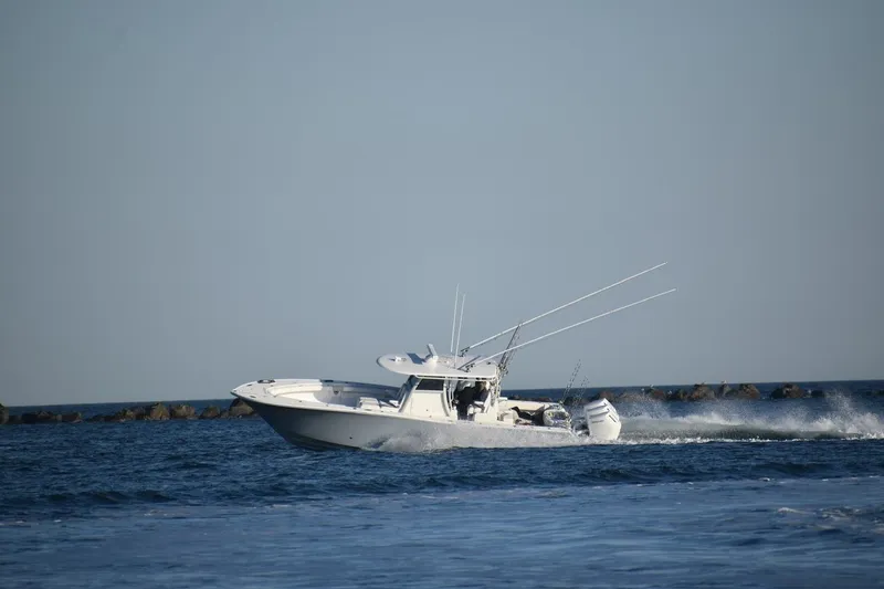 Slide: The Image of 2026 Onslow Bay 37 Tournament Edition boat cruising on open water. - 19