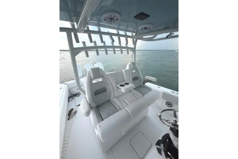 Slide: The Image of Luxurious seating on 2026 Onslow Bay 37 Tournament Edition boat, overlooking serene waters. - 59