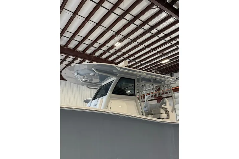 Slide: The Image of 2026 Onslow Bay 37 Tournament Edition boat in a warehouse setting. - 95