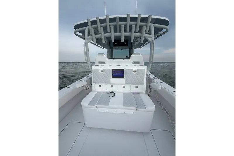 Slide: The Image of 2026 Onslow Bay 37 Tournament Edition boat interior with seating and storage. - 44