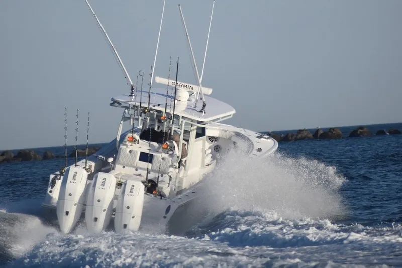 Slide: The Image of 2026 Onslow Bay 37 Tournament Edition boat navigating ocean waves. - 17