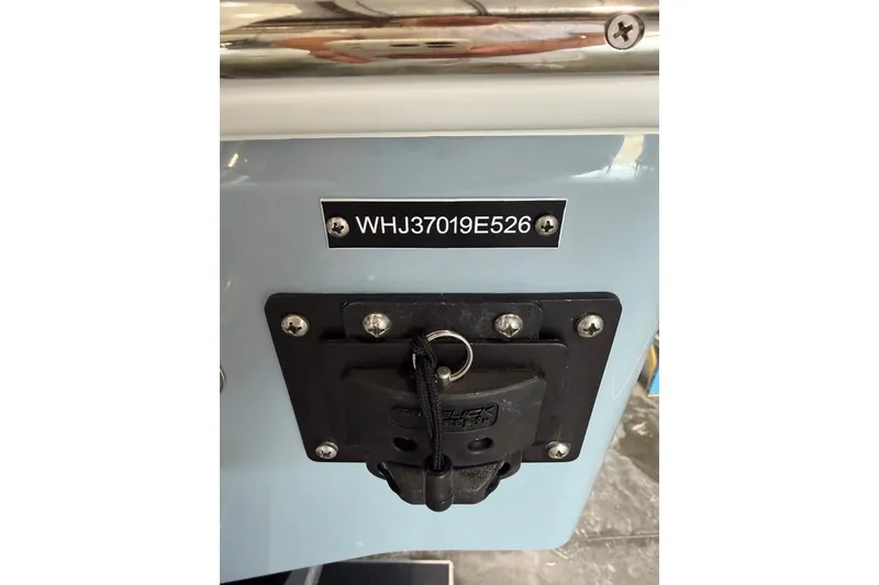 Slide: The Image of 2026 Onslow Bay 37 Tournament Edition boat identification plate and connector. - 97