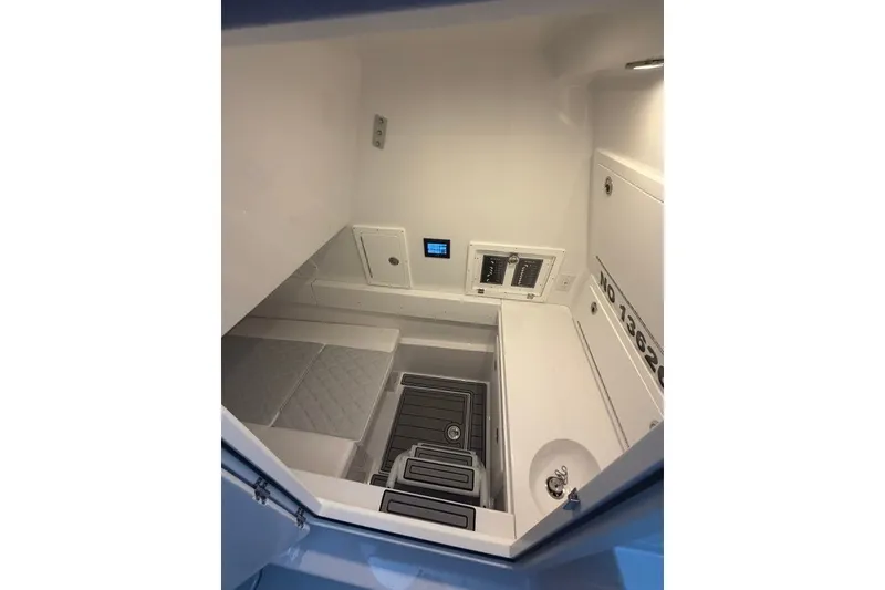 Slide: The Image of Interior cabin of 2026 Onslow Bay 37 Tournament Edition boat, featuring modern amenities. - 28