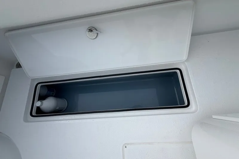 Slide: The Image of Storage compartment on a 2026 Onslow Bay 37 Tournament Edition boat. - 66