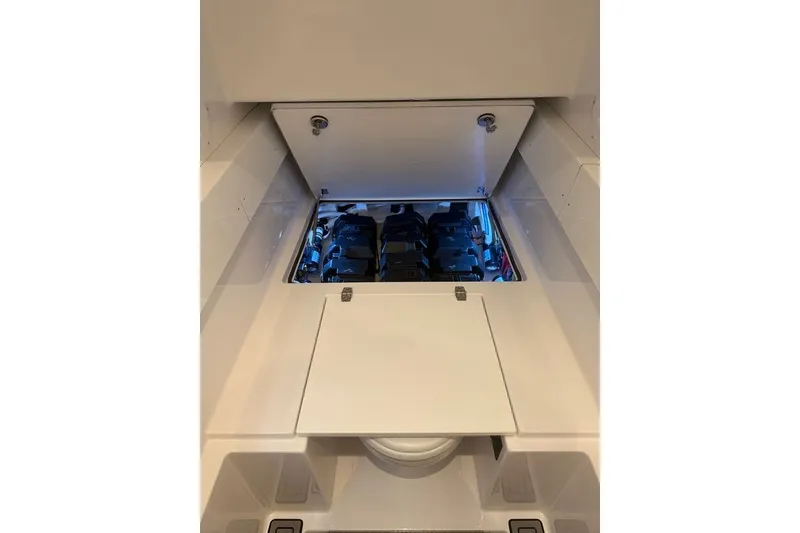Slide: The Image of Engine compartment of 2026 Onslow Bay 37 Tournament Edition boat, showcasing advanced machinery. - 22