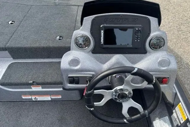Slide: The Image of 2026 Nitro Z17 boat dashboard with steering wheel and navigation system. - 11