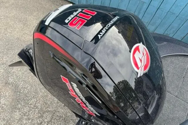 Slide: The Image of Mercury outboard motor on Nitro Z17, 2026 model, with red and white decals. - 14