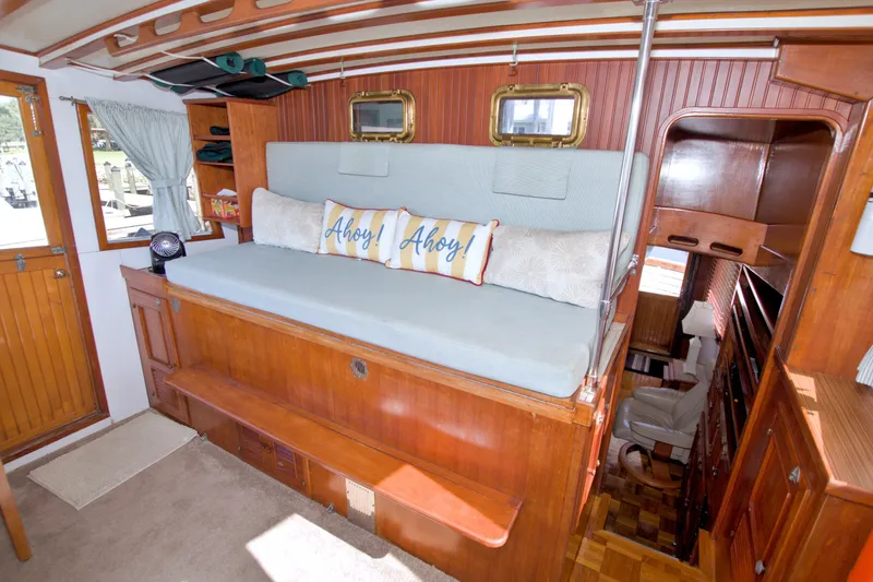 Slide: The Image of Interior of 1980 Kadey-Krogen 42 yacht with cozy seating and nautical decor. - 56