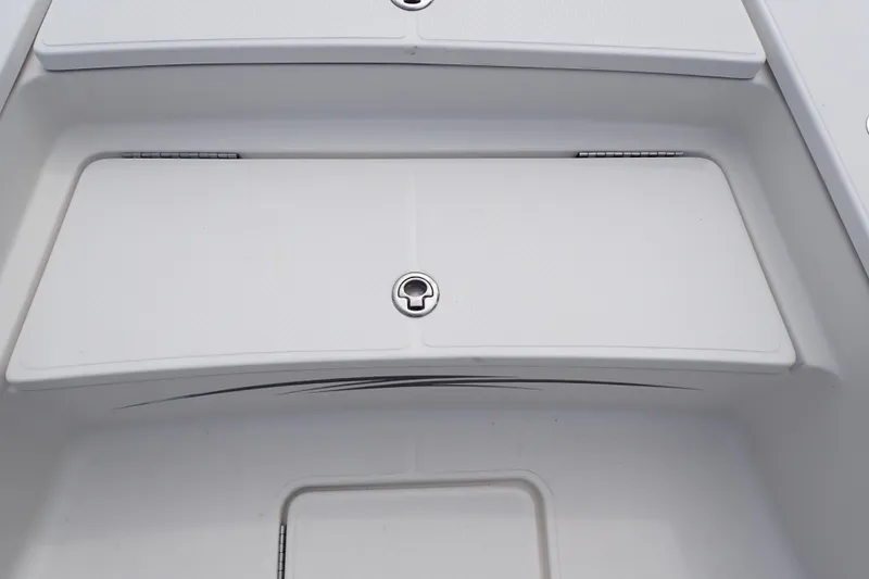 Slide: The Image of 2015 Blue Wave 2400 PureBay boat storage compartment with secure latch. - 43