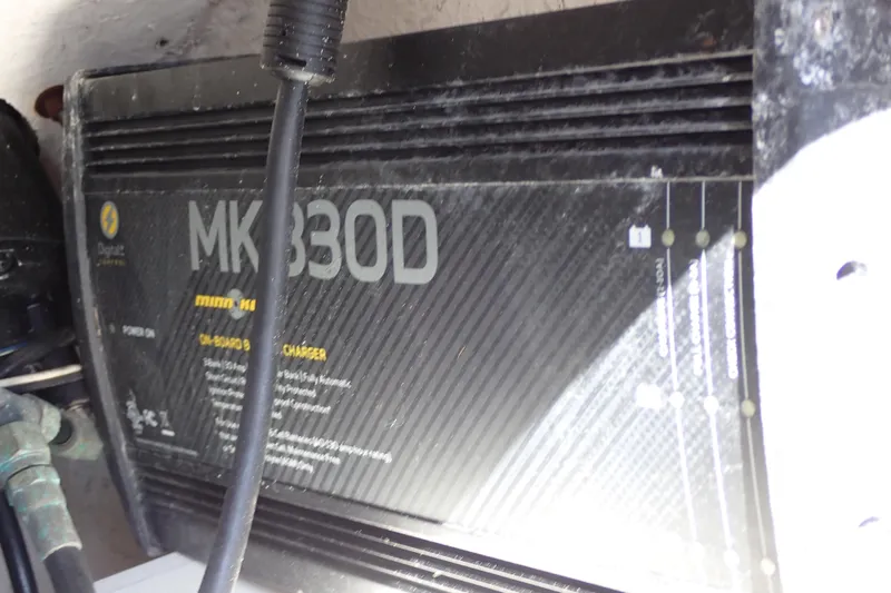 Slide: The Image of Minn Kota MK 330D onboard battery charger in a 2015 Blue Wave 2400 PureBay boat. - 35