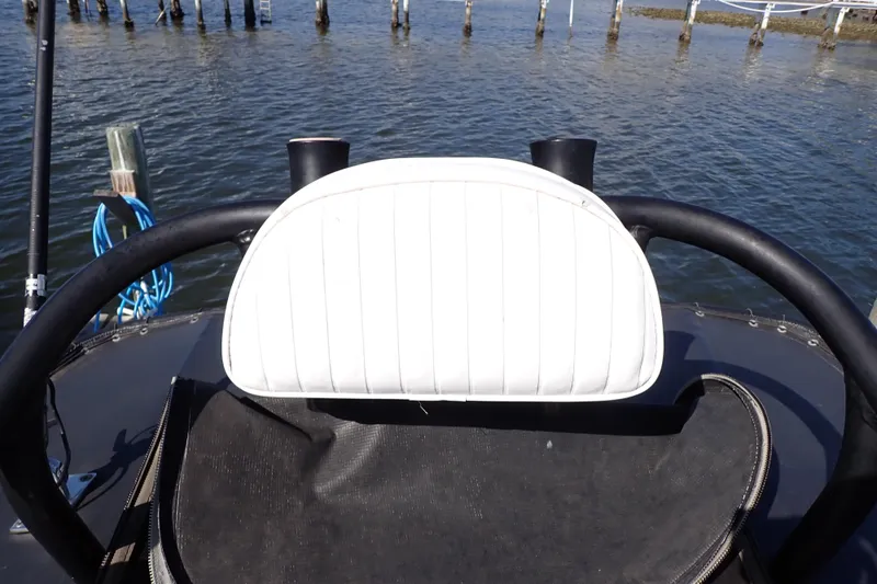 Slide: The Image of Steering view of 2015 Blue Wave 2400 PureBay boat on water. - 89
