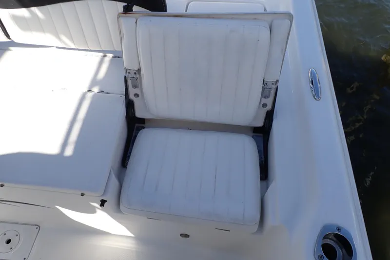 Slide: The Image of 2015 Blue Wave 2400 PureBay boat seat with white upholstery. - 69