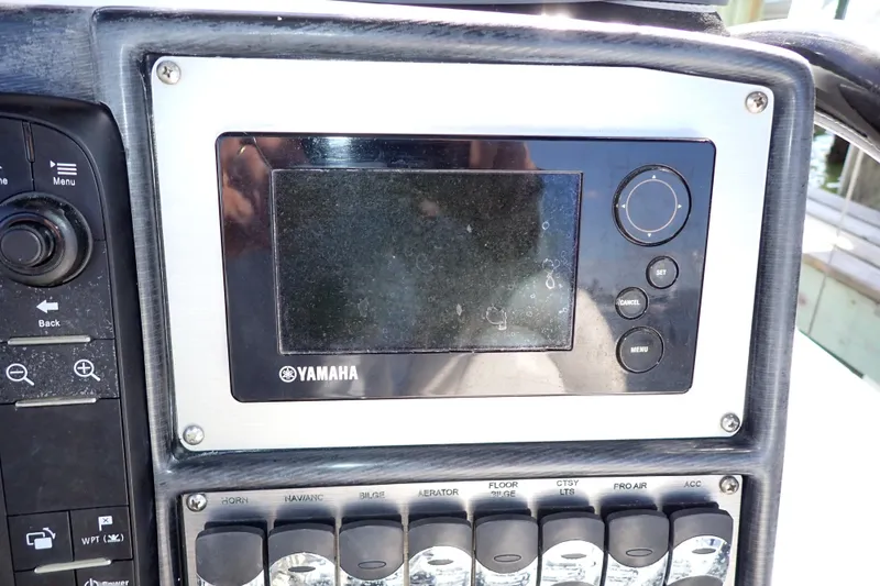 Slide: The Image of Control panel of a 2015 Blue Wave 2400 PureBay boat with Yamaha display. - 24