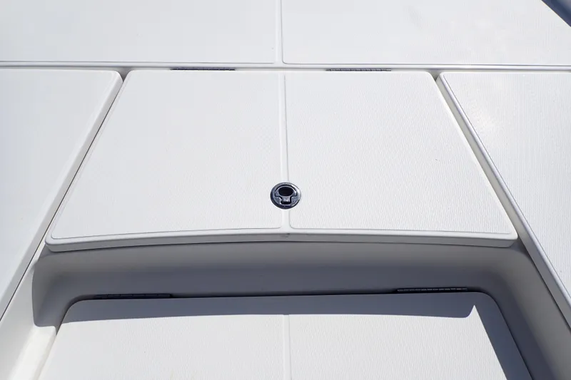 Slide: The Image of 2015 Blue Wave 2400 PureBay boat deck with storage compartment. - 41