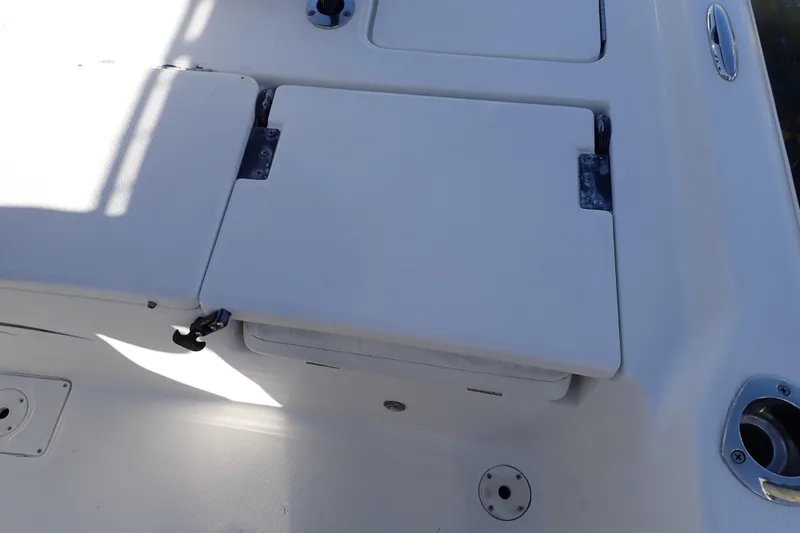 Slide: The Image of 2015 Blue Wave 2400 PureBay boat deck with storage compartment. - 68