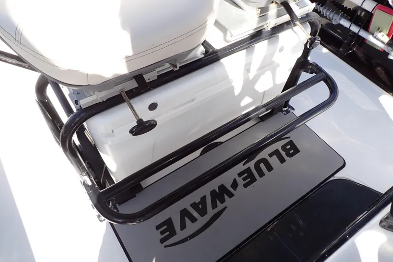 Slide: The Image of 2015 Blue Wave 2400 PureBay boat interior with seating and storage area. - 59