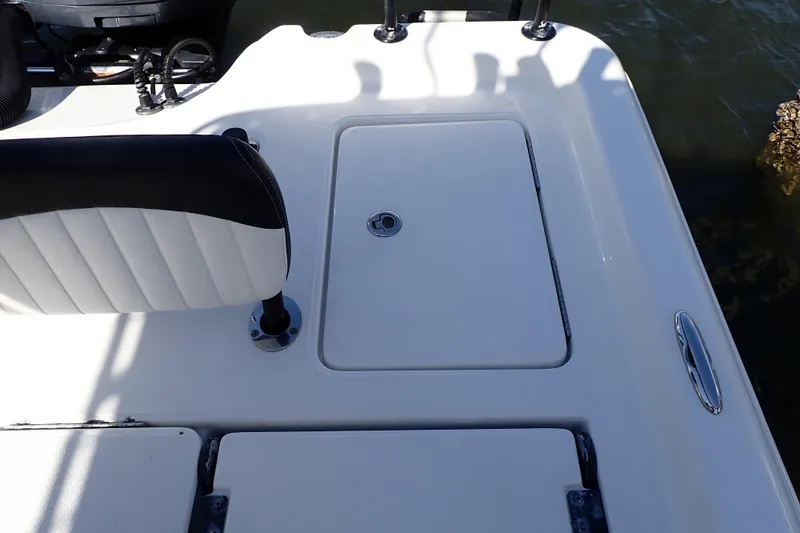 Slide: The Image of 2015 Blue Wave 2400 PureBay boat deck with seating and storage compartment. - 71
