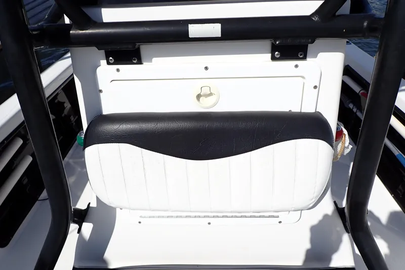 Slide: The Image of 2015 Blue Wave 2400 PureBay boat seat with black and white upholstery. - 33