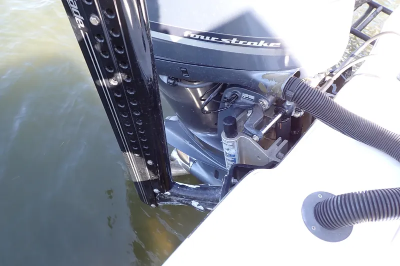 Slide: The Image of 2015 Blue Wave 2400 PureBay boat engine and hydraulic system in water. - 81