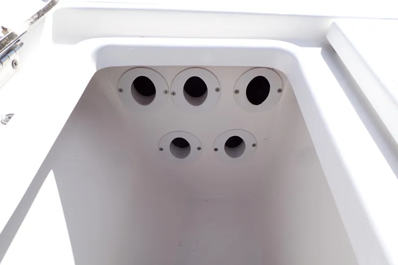 Slide: The Image of Rod holder compartment on a 2015 Blue Wave 2400 PureBay boat. - 47