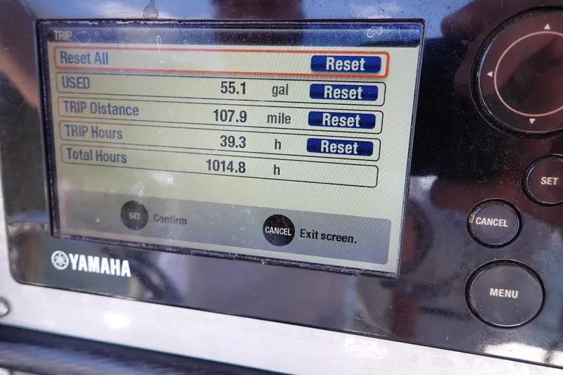 Slide: The Image of Yamaha display showing trip data: 55.1 gallons used, 107.9 miles traveled, 1014.8 total hours. - 25